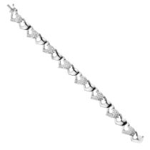 An 18ct white gold diamond heart shaped bracelet with 4.65ct of diamonds