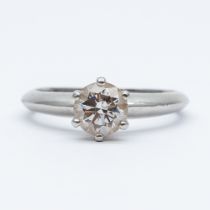 A platinum single solitaire ring