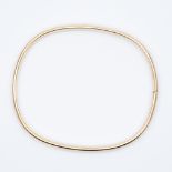 A 9ct yellow gold diamond bangle