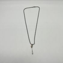 An oxidized silver designer necklace