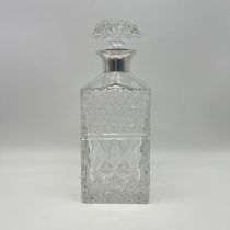 A silver mount crystal decanter