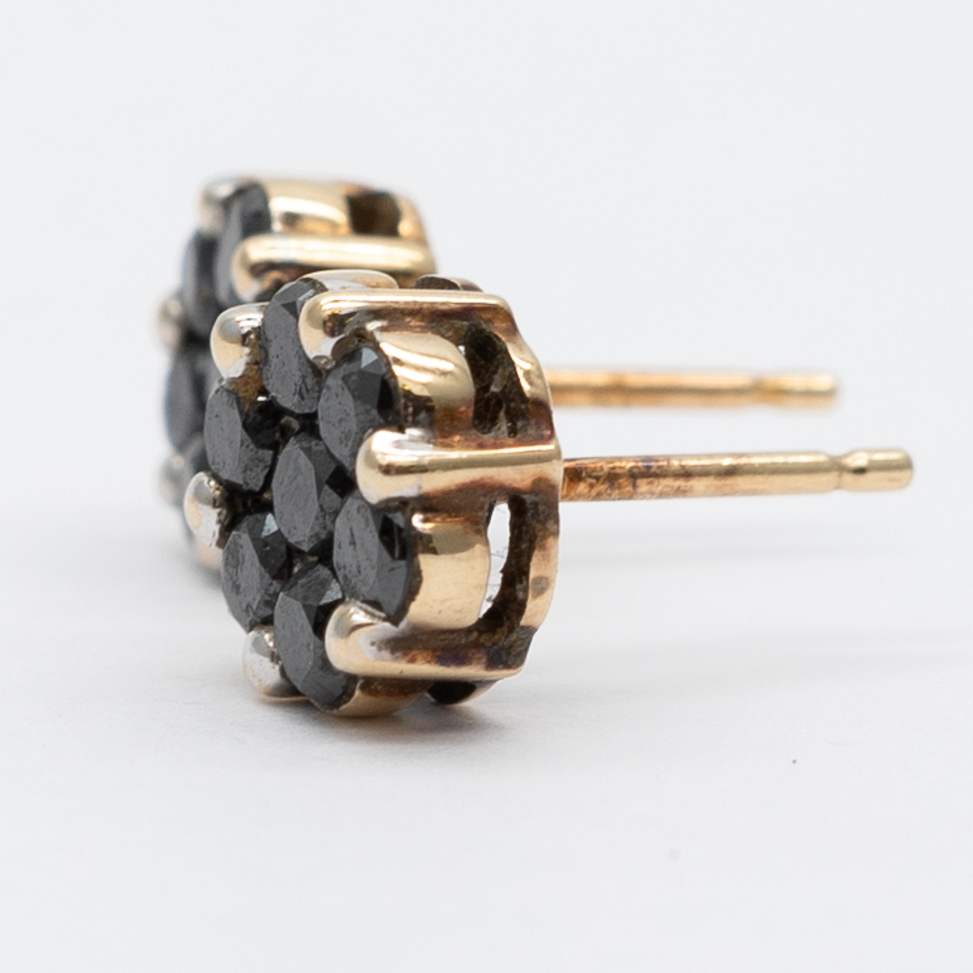 A pair of 9ct yellow gold black diamond stud earrings - Image 2 of 4