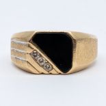 A 14ct yellow gold diamond set gents signet ring