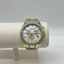 An Ingersoll gold plated and stainless steel 2 tone watch