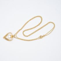 A 9ct yellow gold heart pendant and chain