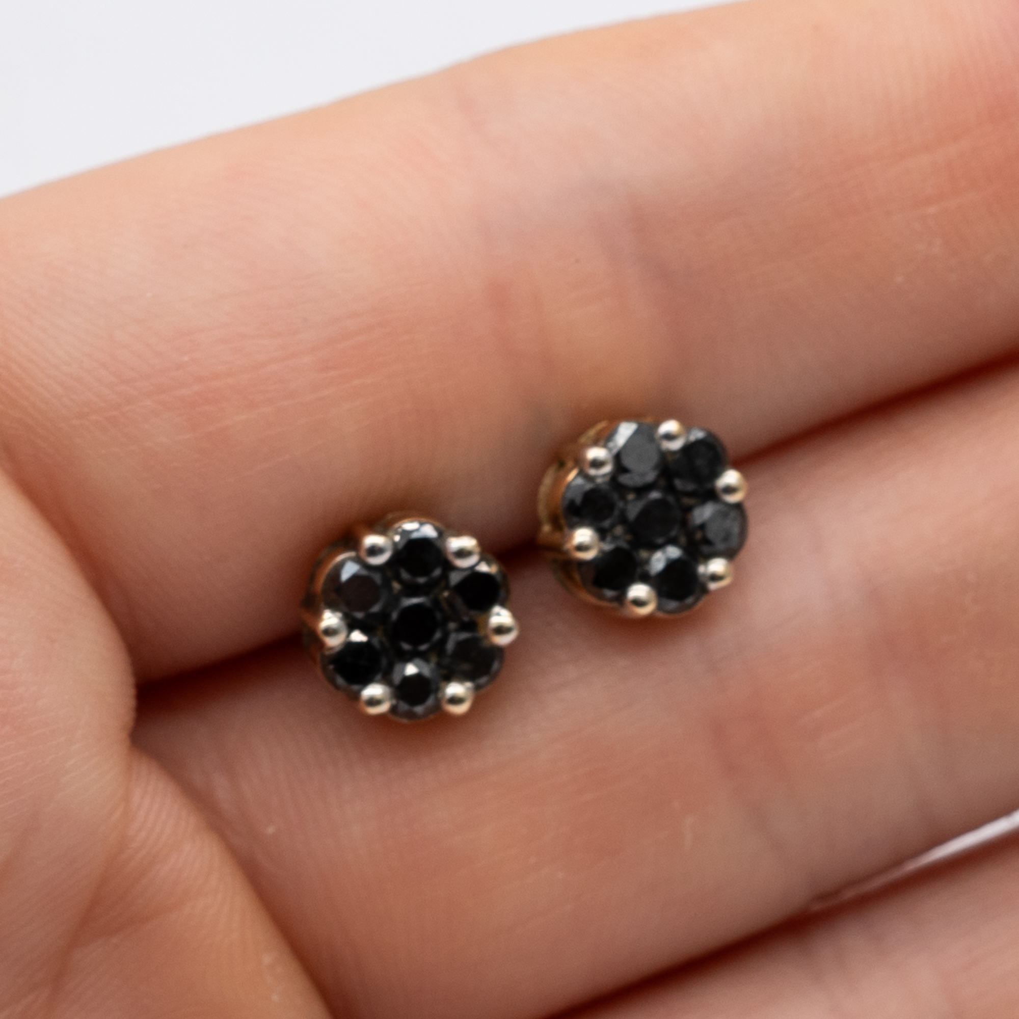 A pair of 9ct yellow gold black diamond stud earrings - Image 4 of 4