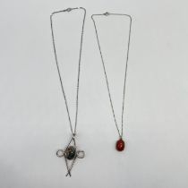 2x silver pendants and chains