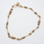 A 9ct yellow gold solid fancy linked anklet