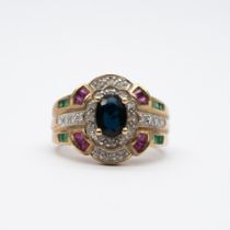 A 9ct yellow gold sapphire and diamond, emerald and ruby set ring