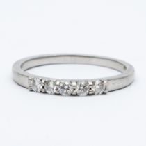 A platinum 5 stone diamond eternity ring