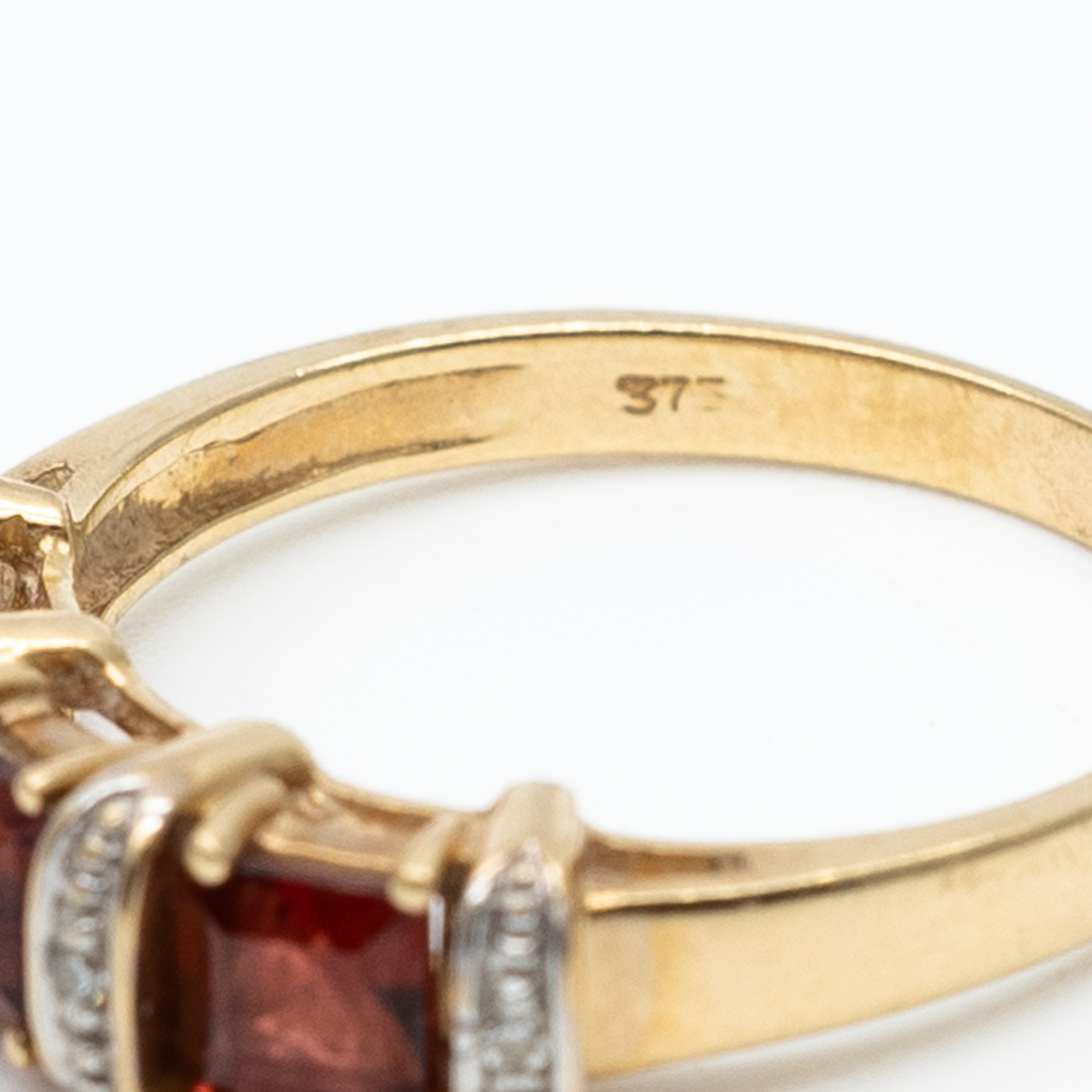 A 9ct yellow gold garnet and diamond dress ring - Image 3 of 4