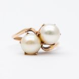 A 14ct yellow gold 2 stone pearl twist ring