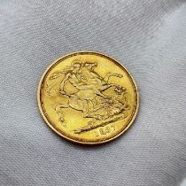 An 1887 double sovereign coin 22ct yellow gold