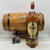 A William Grant whisky barrel and bottle of whisky