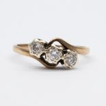 A 9ct yellow gold 3 stone diamond twist ring