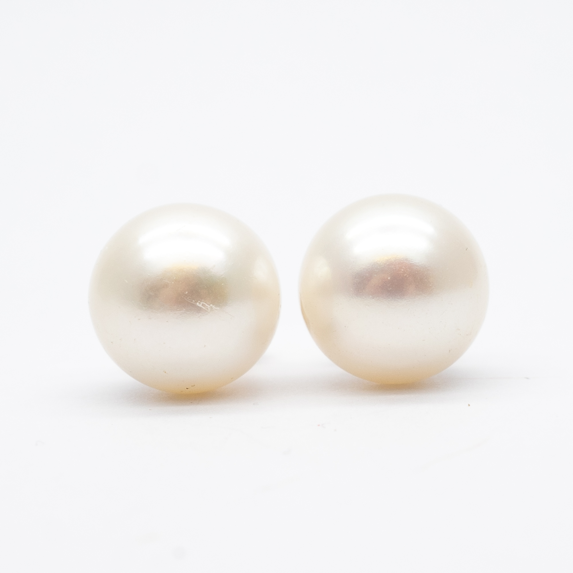 A pair of 9ct yellow gold cultured pearl earrings