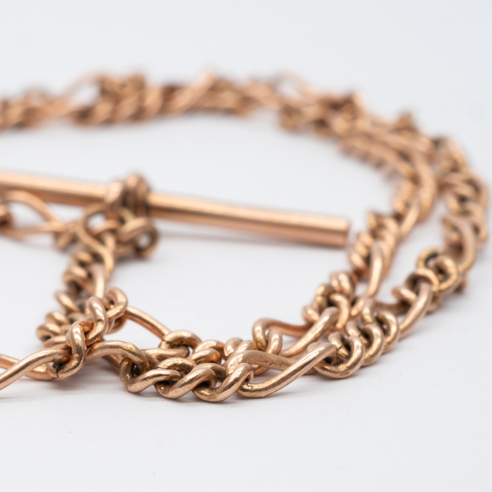 A 9ct rose gold solid linked albert chain - Image 2 of 4