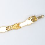 An 18ct yellow gold cz stone set bracelet