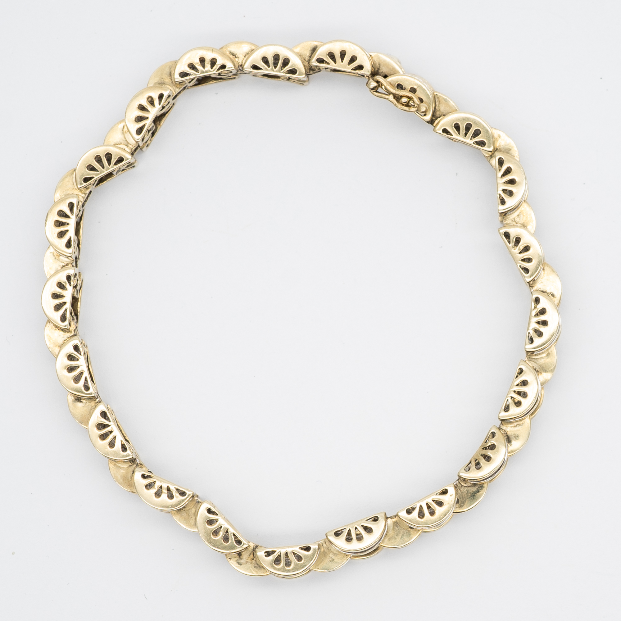 A 9ct yellow gold diamond bracelet