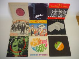 x9 7" Vinyl Lps - Foreigner, AC/DC, The Undertones and others.