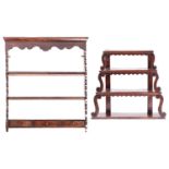 An 18th-century stained wood graduated three-tier Delft rack, supported on the sides by s-shaped