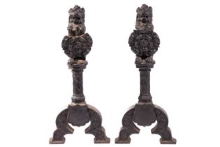 To a design by Augustus Welby Northmore Pugin; a pair of cast iron fire dog fronts with heraldic