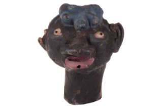 An original over-sized papier mache mask/head, used as a stage prop, from the collection of Vivian