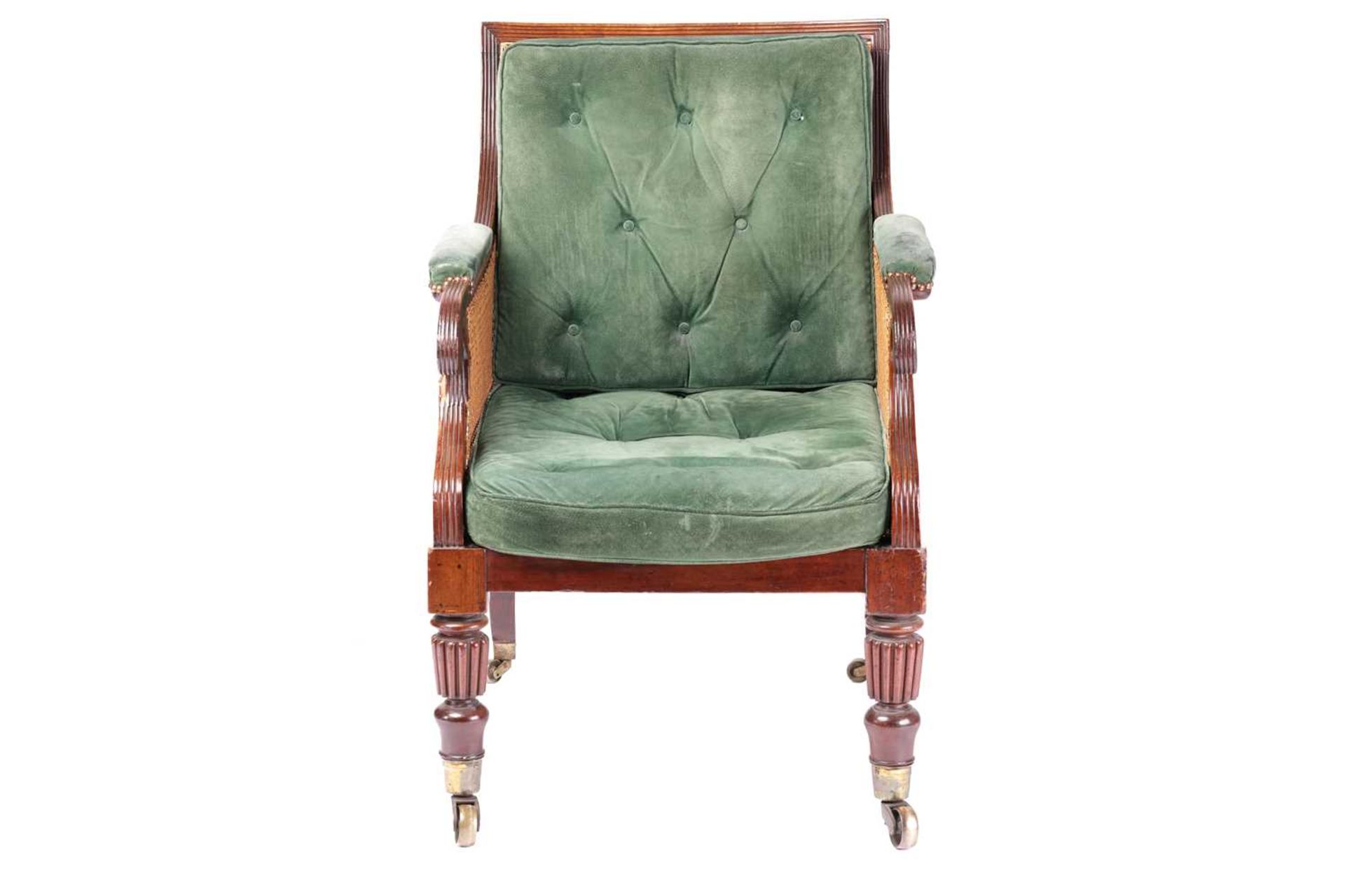 A George IV mahogany frame bergere library chair in the manner of Holland & Co, with cane back and - Image 2 of 7