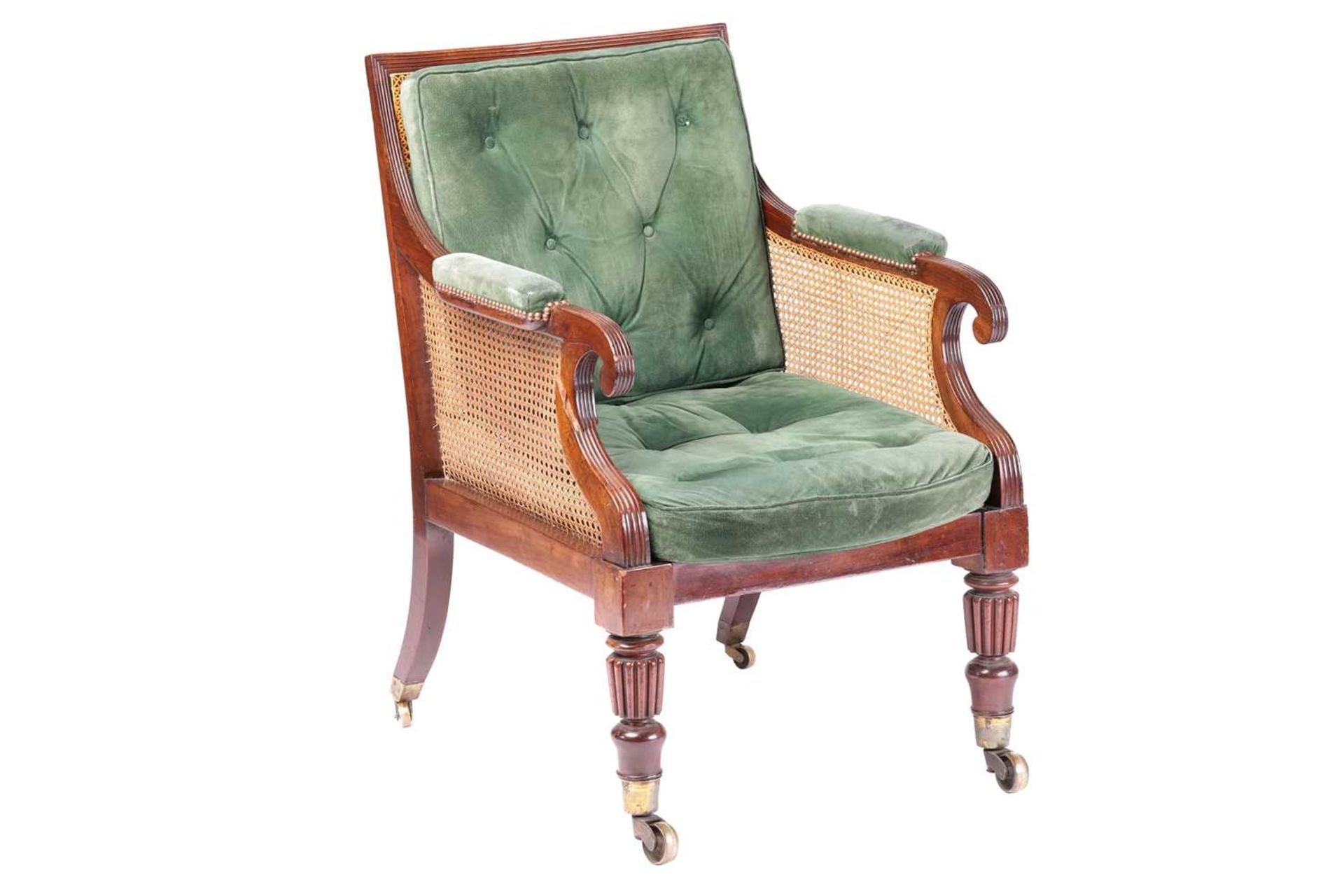 A George IV mahogany frame bergere library chair in the manner of Holland & Co, with cane back and - Image 3 of 7