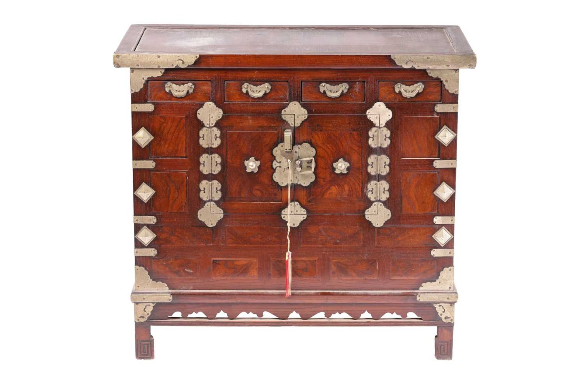 A Korean brass banded elm and stained pine Morijang cabinet with four short drawers over a pair of