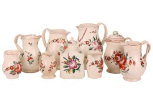 Nine pieces of late eighteenth-century/early nineteenth-century creamware jugs, florally