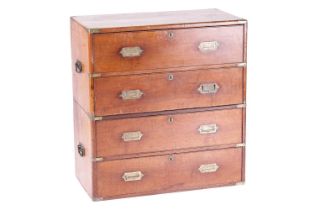 A small Victorian, Maynard & Co of London teak and mahogany two-section campaign chest of drawers,