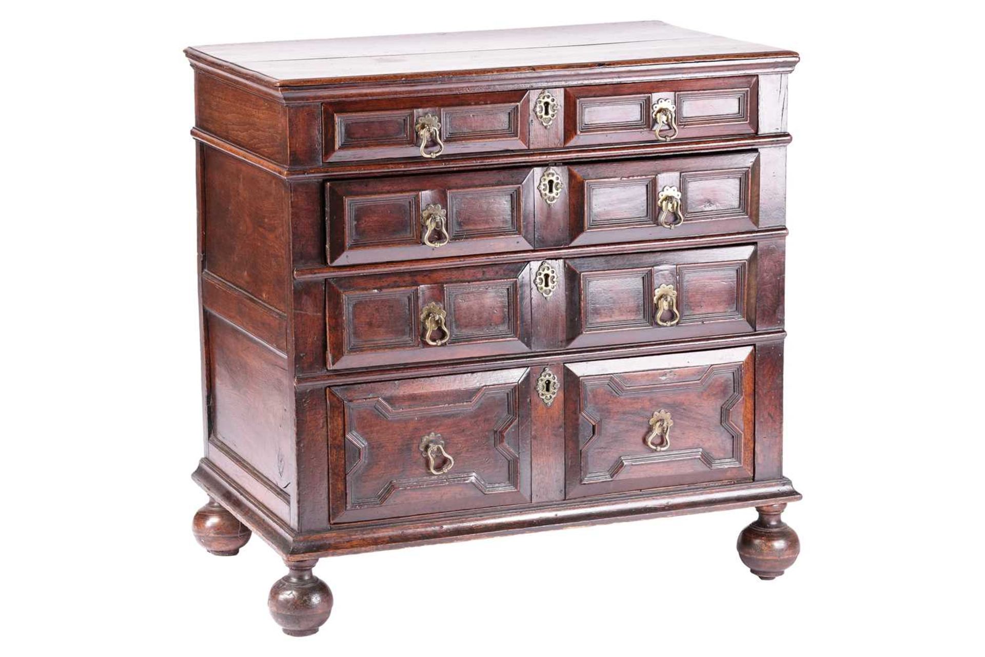 A late 17th-century walnut chest of four long drawers with raised geometric moulded fronts and - Image 2 of 10