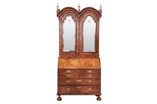 A composite Queen Anne figured walnut double dome bureau bookcase with cross grain moulding