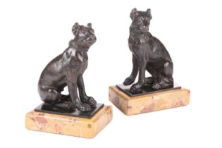 A pair of bronze figures of seated mastiff dogs wearing collars possibly in the manner of Tiziano