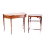 A George III bow-fronted mahogany fold-over tea table, with satinwood crossbanding supported on