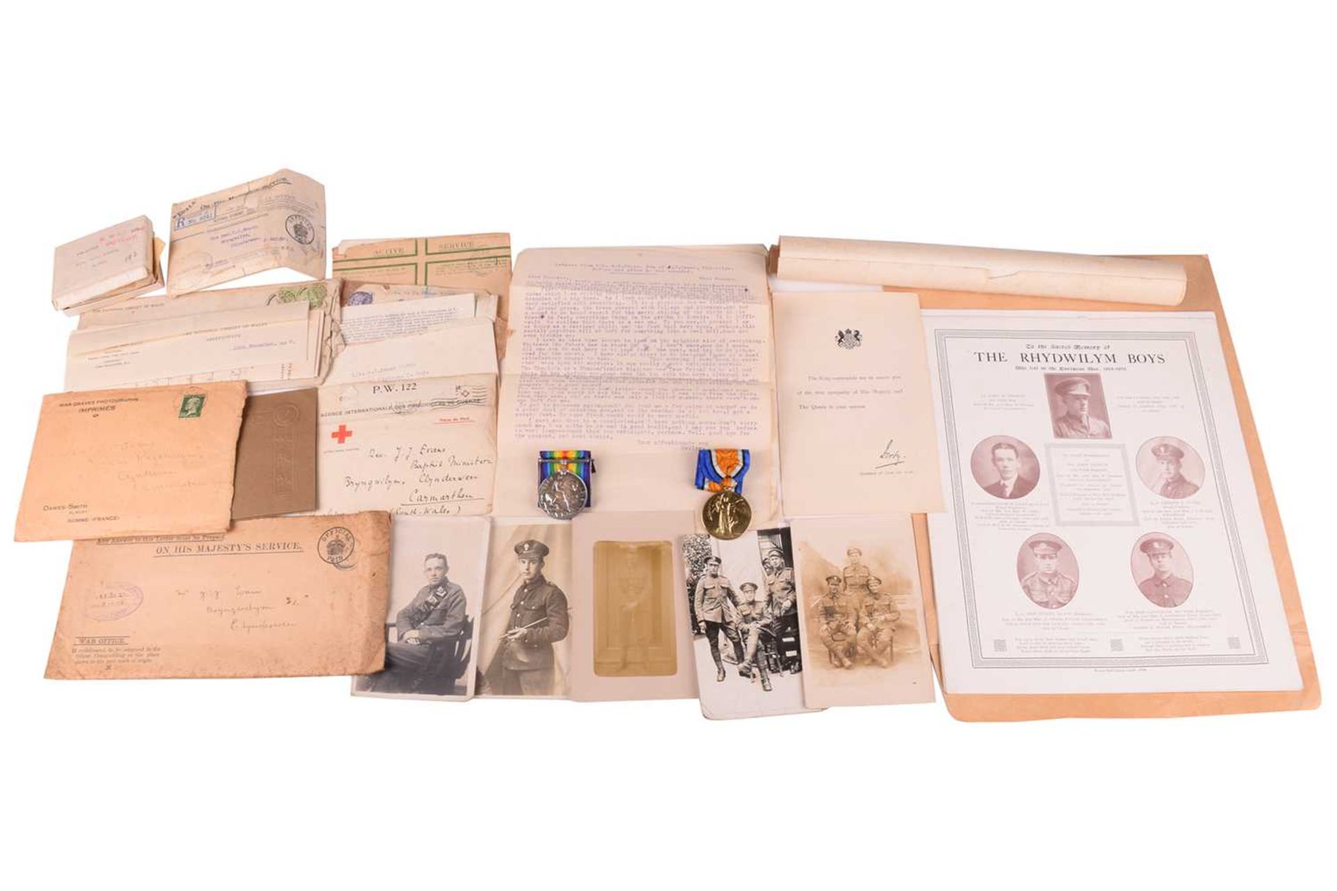 A WWI medal group and associated ephemera, relating to Lance Corporal Gwilym Tyndal Evans 10765,