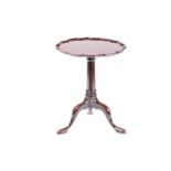 Early George III Cuban mahogany tripod table, pie-crust tilted top on a column base and cabriole