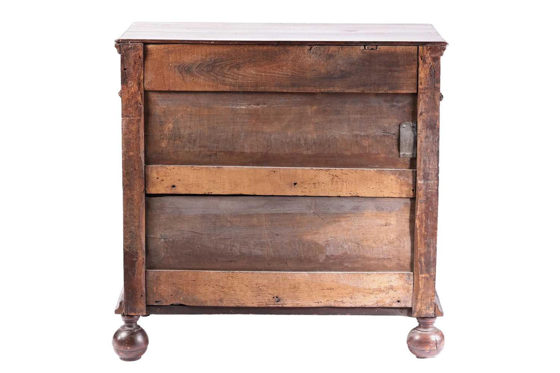 A late 17th-century walnut chest of four long drawers with raised geometric moulded fronts and - Image 6 of 10