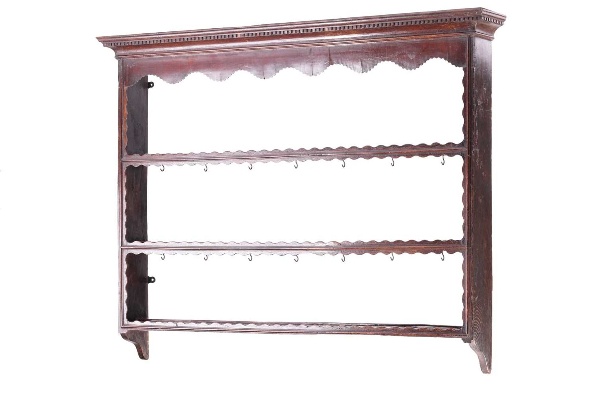 An 18th-century oak three-tier Delft rack with dental cornice, 104 cm high, 132 cm wide, 15.5 cm - Image 2 of 4