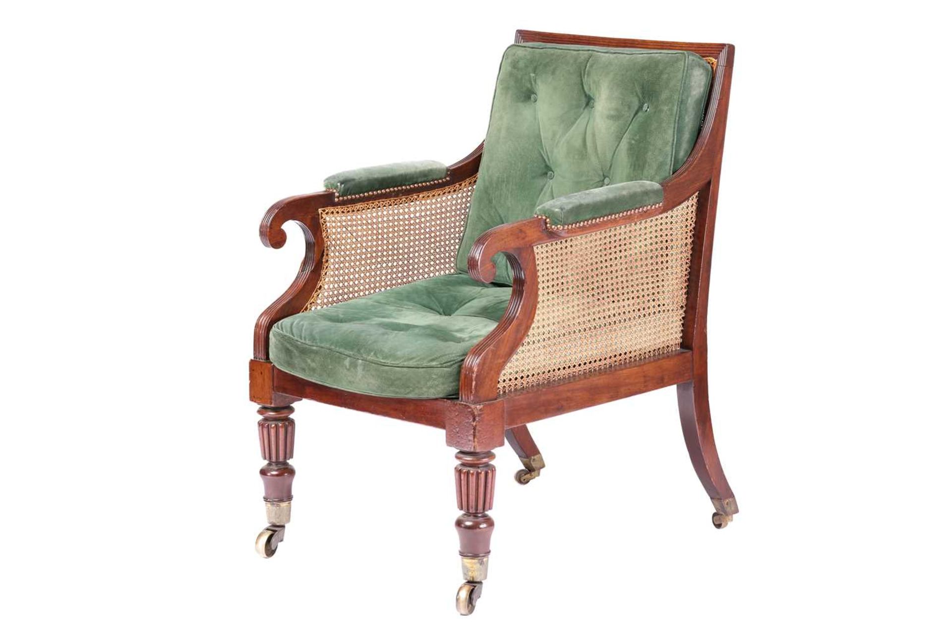 A George IV mahogany frame bergere library chair in the manner of Holland & Co, with cane back and - Image 4 of 7