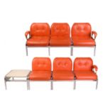 A set of modular Girsberger 'Model 1400' lounge chairs, with orange leather button upholstery and