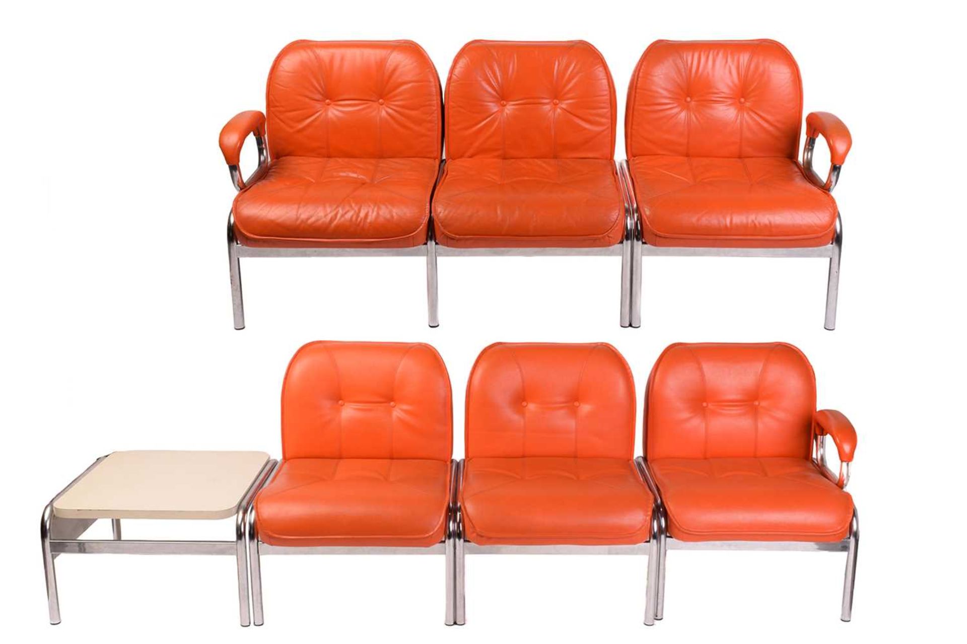 A set of modular Girsberger 'Model 1400' lounge chairs, with orange leather button upholstery and