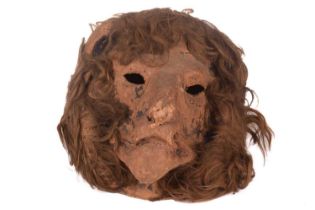 An original papier mache lion mask, used as a stage prop and as seen 'One Man's Week' (1975), from
