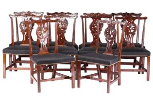 A matched set of ten Chippendale style, George III and later mahogany dining chairs, leaf-capped