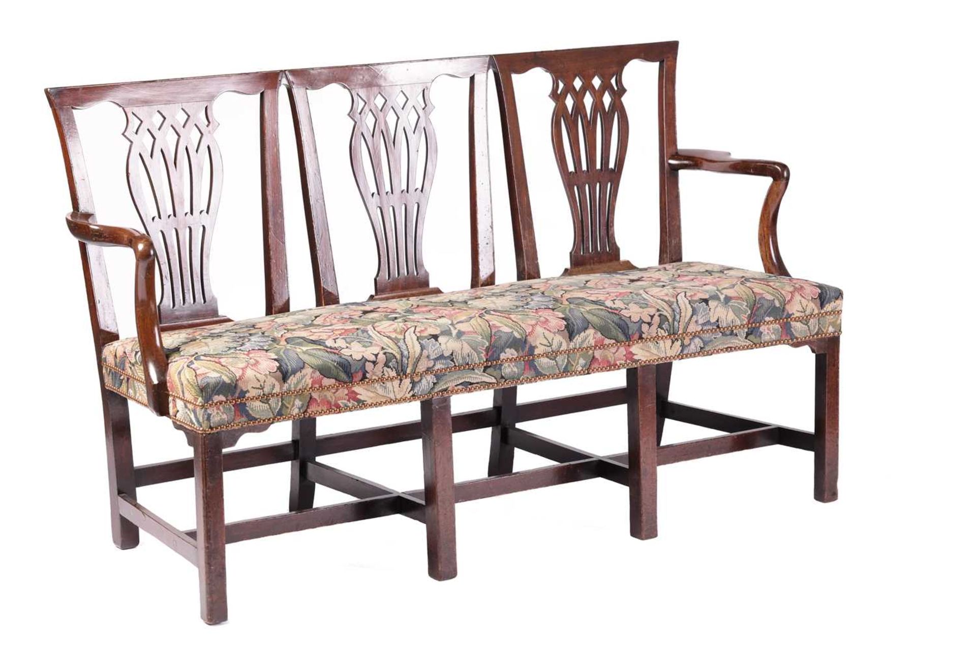 A George III mahogany triple chair back hall seat, with angular backs above three bullrush and - Image 2 of 5
