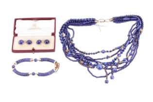 A small collection of lapis lazuli jewellery items; including a pair of lapis lazuli cabochon and