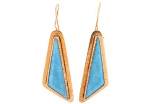 A pair of reconstituted turquoise pendant earrings; the oblique triangular drops set with