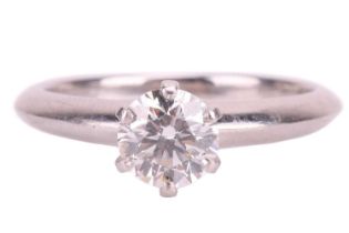 A Tiffany & Co. diamond solitaire ring, set with a round brilliant cut diamond with an estimated