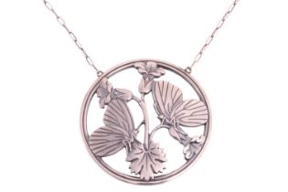 Georg Jensen - a round openwork necklace depicting two butterflies resting upon bellflowers,